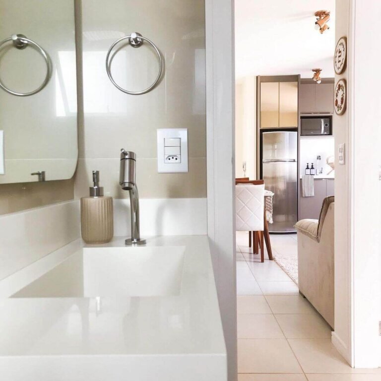 banheiro com cuba esculpida em quartzo branco marmoraria palhoça